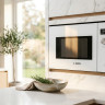 Встраиваемая микроволновая печь Bosch BFL7221W1 белый, 21 л, 900 Вт, переключатели - сенсор, поворотный механизм